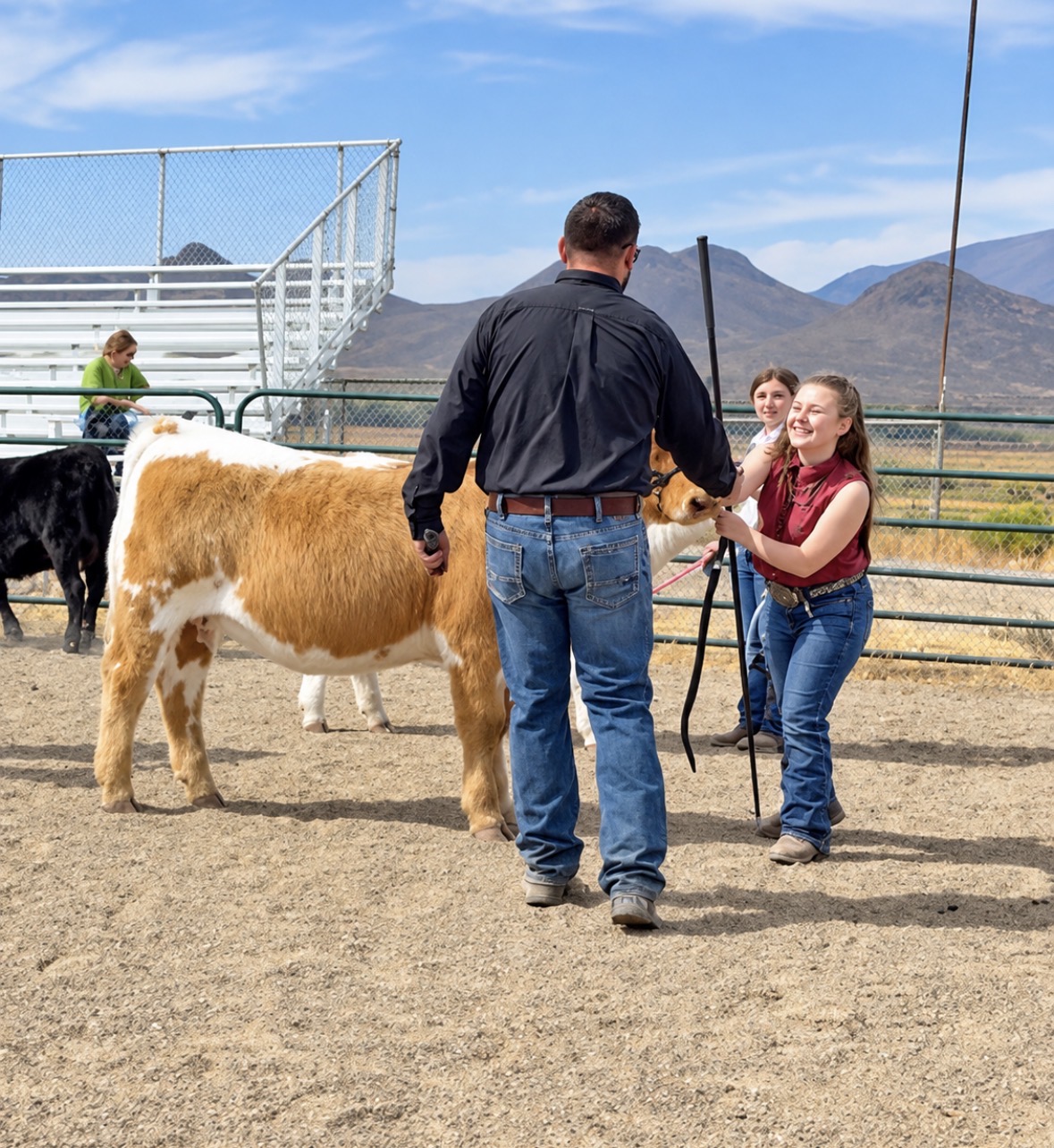 Bar JM youth exhibitor with heifer and judge